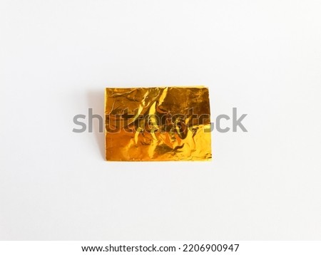 gold foil isolated on white background.beautiful color paper.