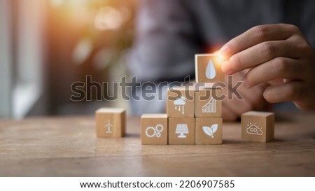 User holding a wooden block agricultural growth concept It has both soil and plant benefits. Including the use of artificial intelligence agriculture technology in 5G technology.