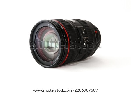 Close up and isolated shot of a DSLR camera lens 24 105mm Royalty-Free Stock Photo #2206907609