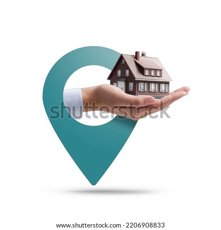 Business woman Hand holding a model house: home insurance and real estate concept On white background