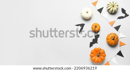Composition with pumpkins and Halloween decor on white background with space for text