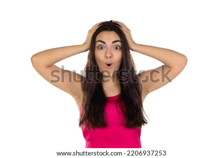 Woman excited wearing a pink top isolated on a white background