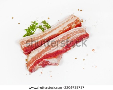 fresh streaky pork isolate on white background. Royalty-Free Stock Photo #2206938737