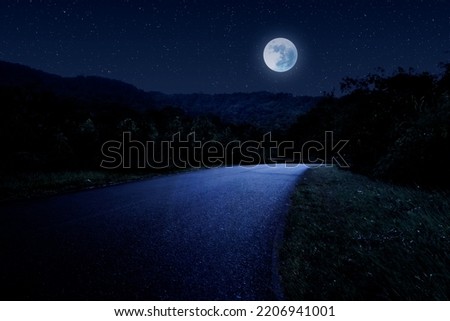 Road at night landscape with full moon and stars