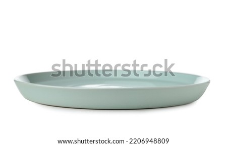 Empty ceramic plate isolated on white Royalty-Free Stock Photo #2206948809