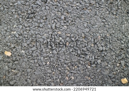 a photo of a black asphalt road texture