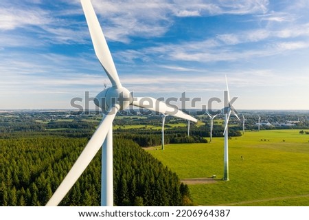 Windmills in a rural area Royalty-Free Stock Photo #2206964387