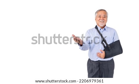 retired asian elderly man broken arm wear arm splint for treatment confident lifestyle, Old elderly male medical care.