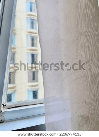 selective focus of the building blocked by curtains