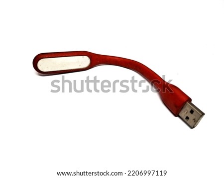 Red LED light stick that can be used as a power bank, white background