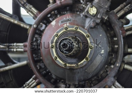 Closeup photo of a jet engine of a vintage airplane.