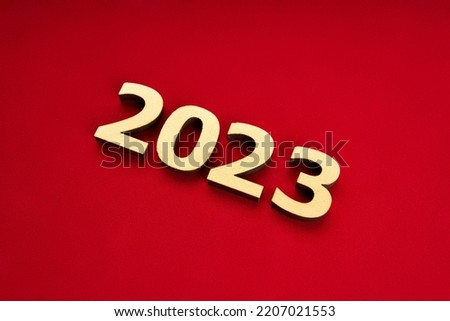 Happy New Year 2023 poster. Christmas background with big gold 2023 numbers. Merry Christmas and Happy New Year. Christmas, winter, new year concept. Greeting card, banner with place for text