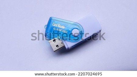 This is a tool used to transfer data from a memory card to a computer or commonly called a card reader.