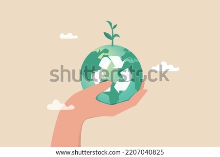 Sustainability, ecology or renewable energy to save the world from climate change or global warming, environmental safe or recycle concept, hand holding sustainable green world with recycle symbol. Royalty-Free Stock Photo #2207040825