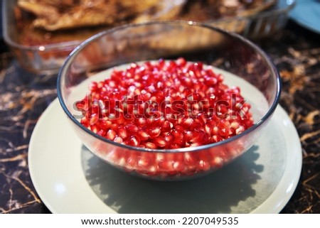 Eating pomegranate seeds is one of my pleasures Royalty-Free Stock Photo #2207049535