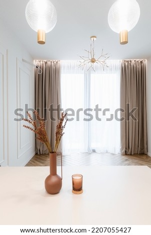 a large New Empty room with a large window, lighting and a table