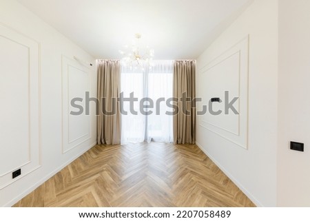 interior design of a new bright room with a large window