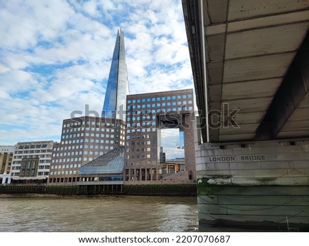 Under the London Bridge looking at the Shard