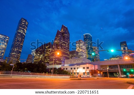 View of downtown Houston at twilight with skyscraper