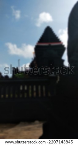 blurred background showing the temple where worship