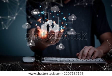 Cloud storage, Digital service data connection application network, transfers data to a server, hosting service. Web-based cloud concept. Business hands holding virtual Clouds services. Royalty-Free Stock Photo #2207187175