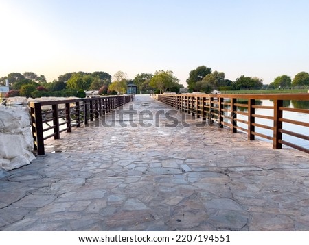 Wooden bridge over Aspire Lake, Doha, Qatar