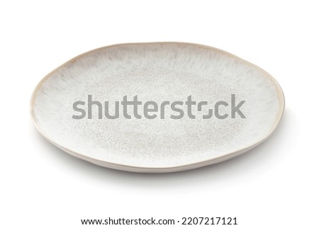 Empty trendy handmade ceramic dish isolated on white Royalty-Free Stock Photo #2207217121