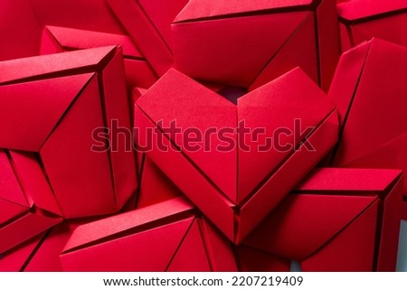 red paper heart background,Bunch of cut out of pink and red paper hearts on red background. Cute Valentines day, Womans day, love, romantic or wedding card, banner, invitation, sale, offer, ad backgro