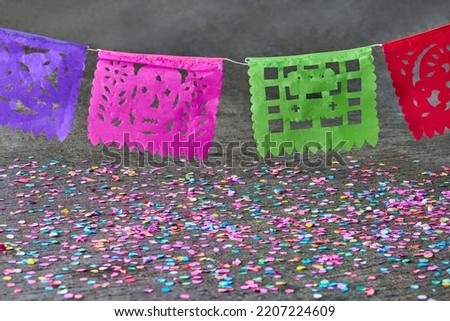 Traditional Mexican punched paper for celebration
Papel picado for the Day of the dead in Mexico
                 