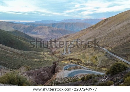 Windy roads to Salinas Grandes from Purmamarca and San Salvador de Jujuy. Royalty-Free Stock Photo #2207240977