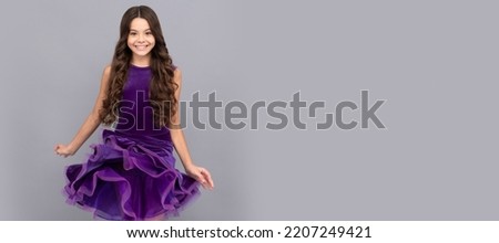 cute happy teen girl with long curly hair dancing in ballroom dress full length, youth. Child face, horizontal poster, teenager girl isolated portrait, banner with copy space.