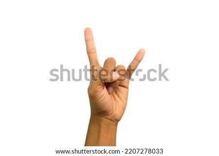 Male hand showing Rock N Roll Signature isolated on white background. Horn sign. If you feel really cool, do a rock n roll autograph