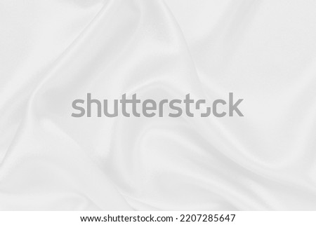 Closeup of white smoot fabric as a background Royalty-Free Stock Photo #2207285647