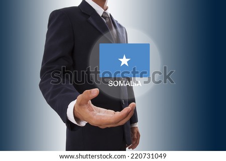 Businessman hand showing Somalia Flag