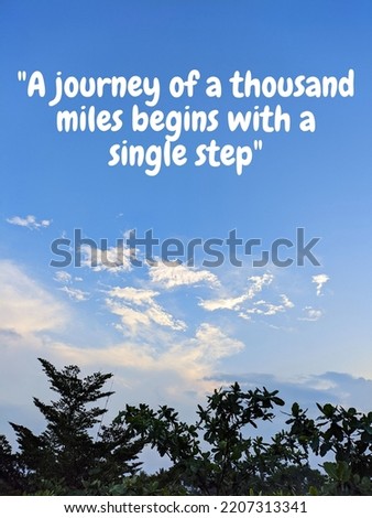 Inspirational quote "A journey of a thousand miles begin with a single step" in blue sky background