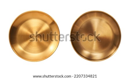 Top view of golden plate isolated on white background. Royalty-Free Stock Photo #2207334821