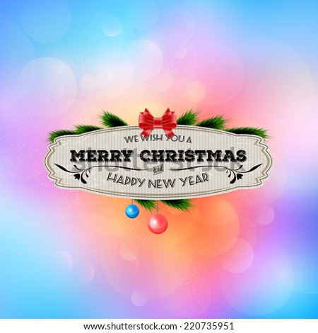 Vector christmas greeting card - retro label over a bright and colorful blurred unfocused photographic background