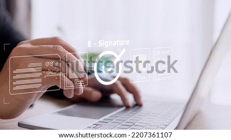 Online business contract Electronic signature, e-signing, digital document management, paperless office, signing business contract concept. Royalty-Free Stock Photo #2207361107