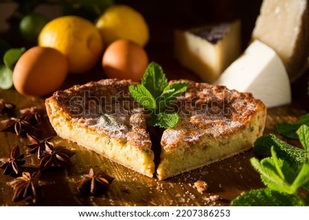 Flaó traditional dessert from Ibiza. The cheesecake is a unique combination of flavors — anise and mint. The filling is made from fresh cheese (or ricotta and mascarpone), eggs and chopped min