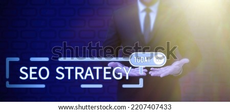 Text sign showing Seo Strategy. Business concept Techniques and tactics to increase the visitors of a website
