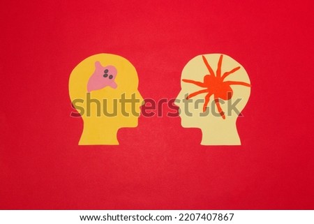paper head is seen in one ghost in the other spider, creative Halloween concept, paper craft