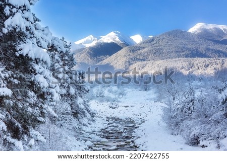 Bansko, Bulgaria travel winter landscape panorama of snow Pirin mountain peaks and river Glazne Royalty-Free Stock Photo #2207422755
