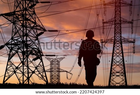 Silhouette of engineers workers at electricity station