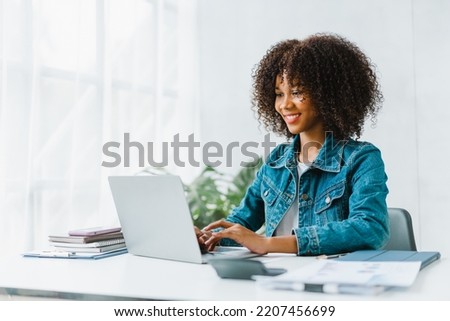 Close up portrait beautiful woman smiling and using laptop computer.