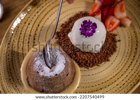 Typical peruvian food and drinks, chocolate volcano dessert with ice cream