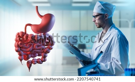 Digestive health. Man doctor with test tube and medical card. Doctor analyzes stomach. Treatment of patients digestive system. Gastroenterologist analyzes digestive system. Man doctor  Royalty-Free Stock Photo #2207540741