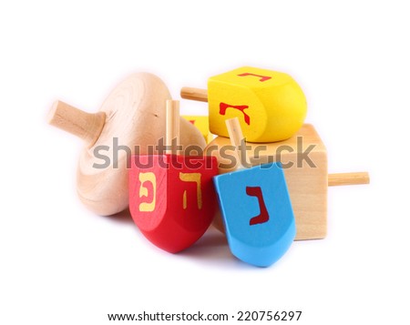 wooden dreidels (spinning top) for hanukkah jewish holiday isolated on white 