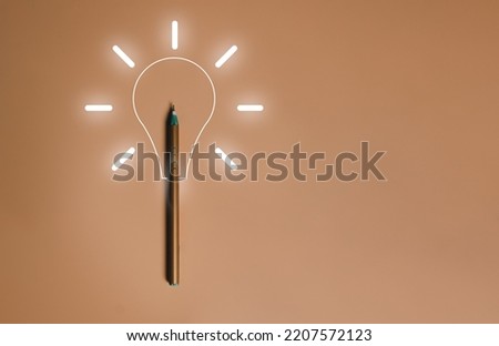Creative thinking idea from Pen and light bulb glowing,  sign of innovation, solution, education concept with copy space. 