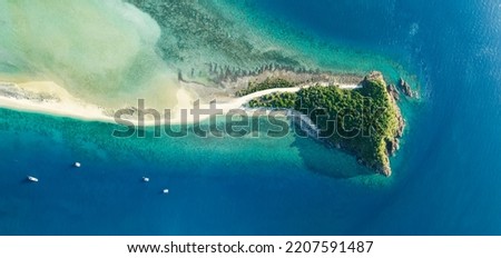 XXL high resolution panoramic high angle aerial drone view of Langford Island near Hayman Island, a luxury resort in the Whitsunday Islands group near the Great Barrier Reef, Queensland, Australia. Royalty-Free Stock Photo #2207591487