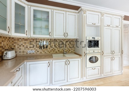 Kitchen furniture in a classic slyle. Elegant furniture design concept Royalty-Free Stock Photo #2207596003